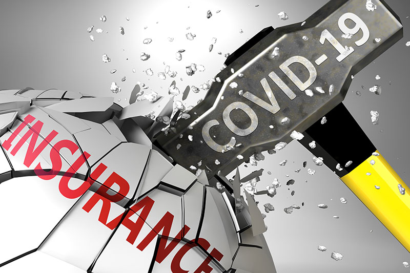 Insurance and Covid-19 virus, symbolized by virus destroying wor Business Interruption Insurance